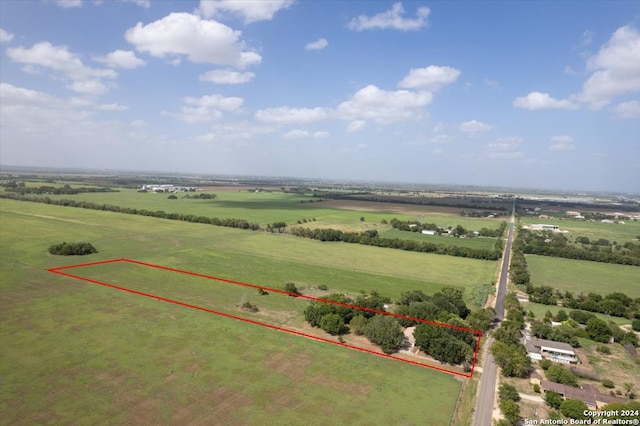 birds eye view of property featuring a rural view