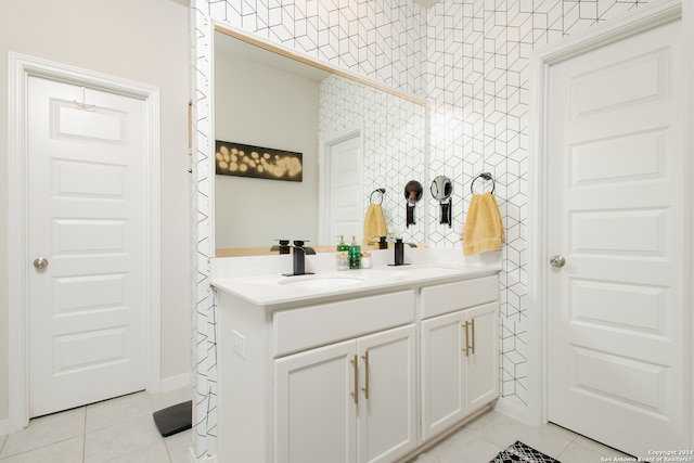 bathroom featuring double vanity and tile patterned floors