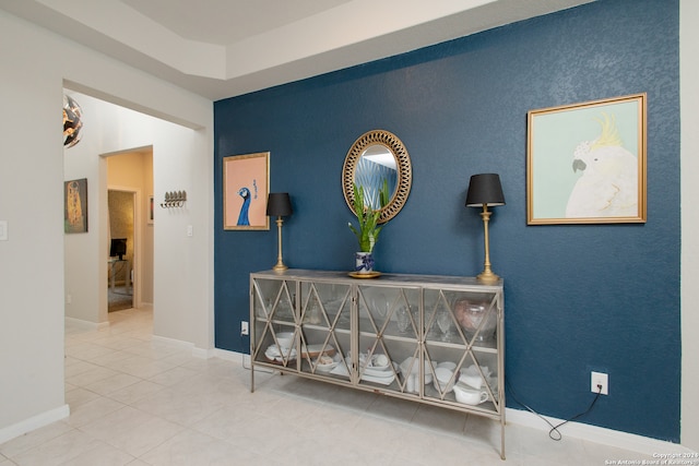 corridor featuring tile patterned flooring