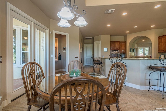 dining space with light tile patterned floors