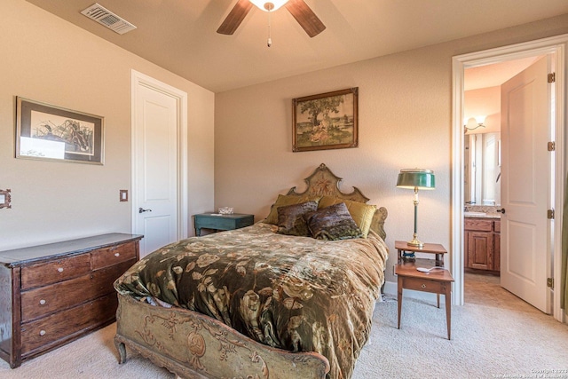 bedroom with light carpet and ceiling fan