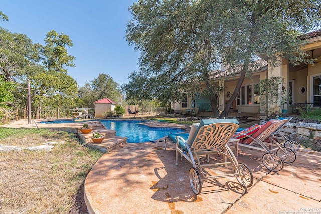 view of pool with a patio