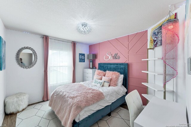 bedroom featuring a textured ceiling