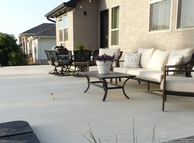 view of patio featuring an outdoor living space