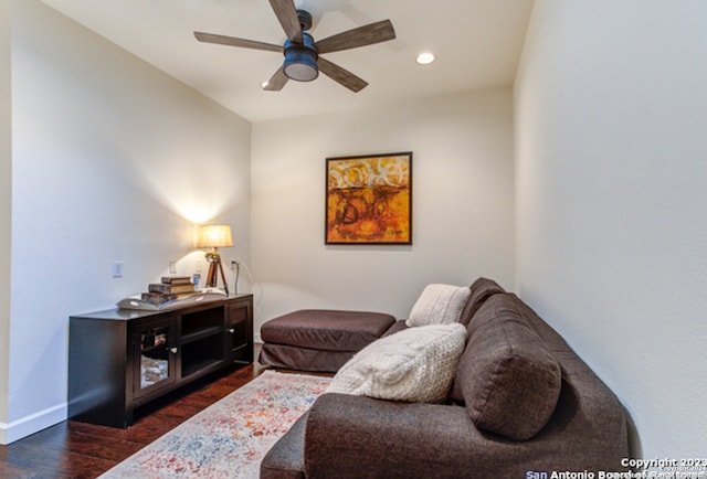 interior space with ceiling fan and dark hardwood / wood-style floors