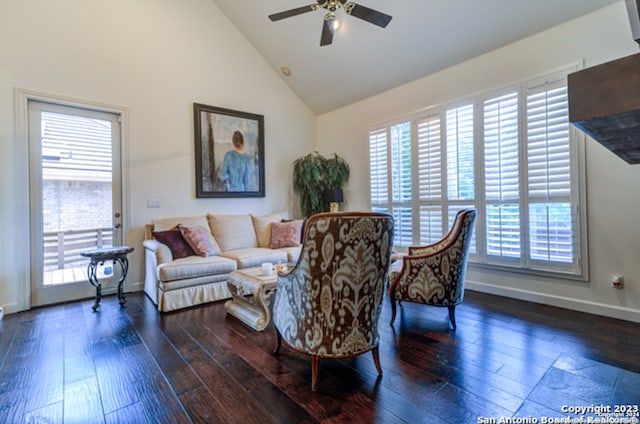 living room with ceiling fan, dark hardwood / wood-style floors, and high vaulted ceiling