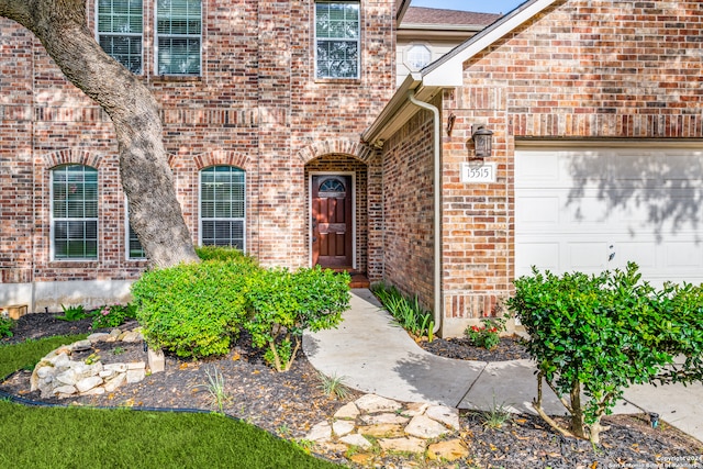 entrance to property featuring a garage