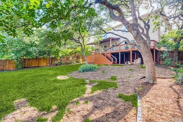 view of yard with a deck