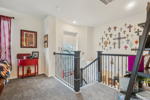 hallway with carpet flooring