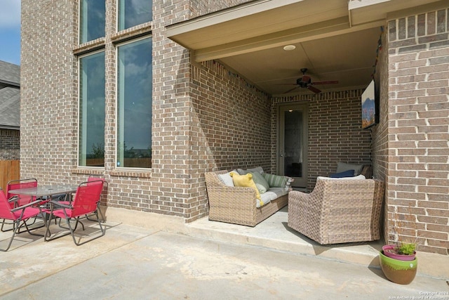 view of patio featuring an outdoor living space and ceiling fan