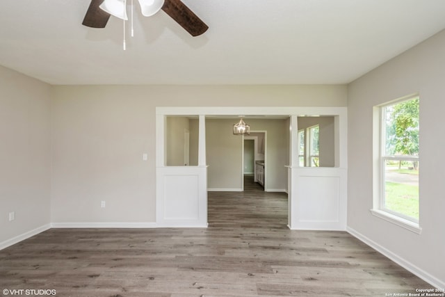 unfurnished room featuring wood-type flooring and ceiling fan