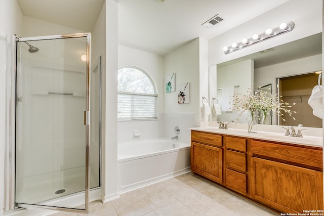 kitchen featuring sink, dishwasher, light tile patterned floors, and backsplash