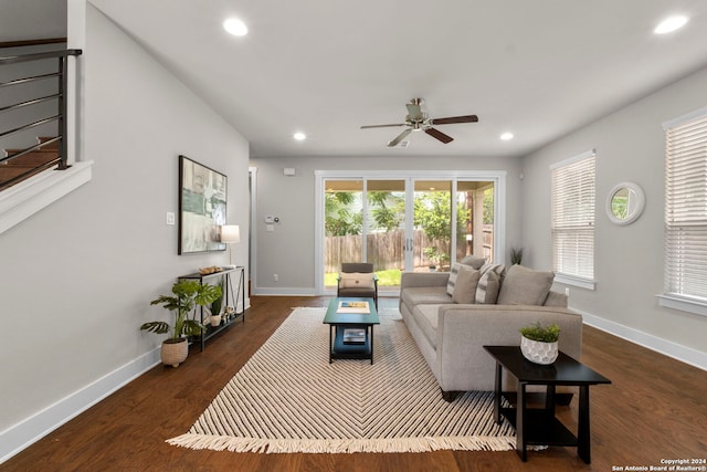 living room featuring ceiling fan, baseboards, dark wood-style flooring, and recessed lighting