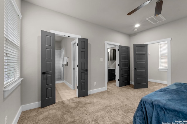 bedroom featuring light carpet, visible vents, baseboards, and recessed lighting