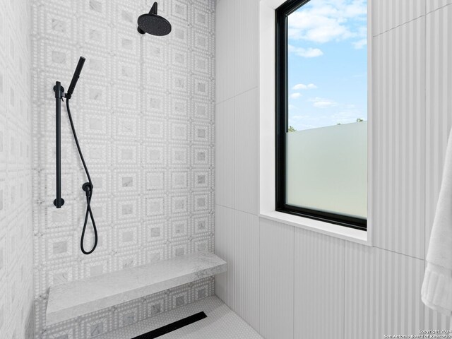 interior space featuring tiled shower