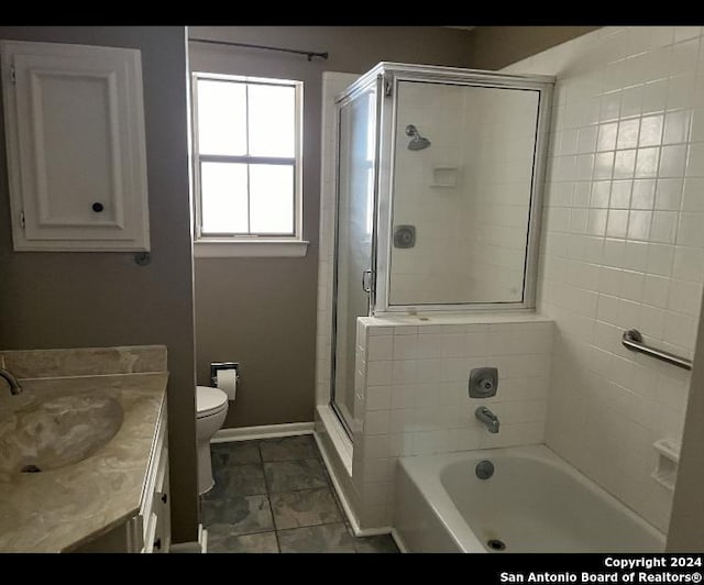 full bathroom featuring vanity, toilet, and plus walk in shower