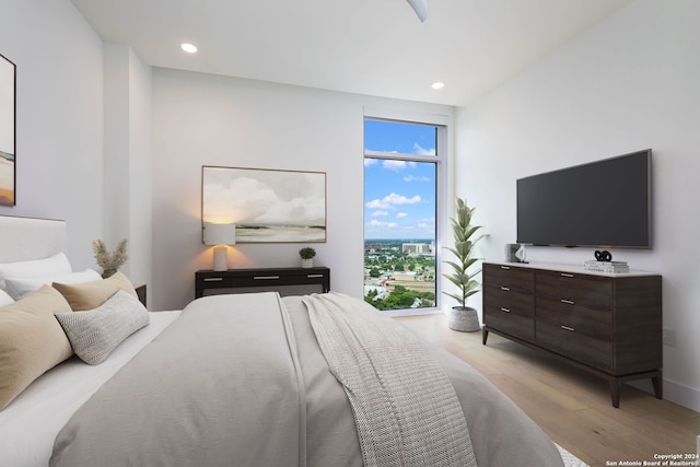 bedroom featuring light hardwood / wood-style floors