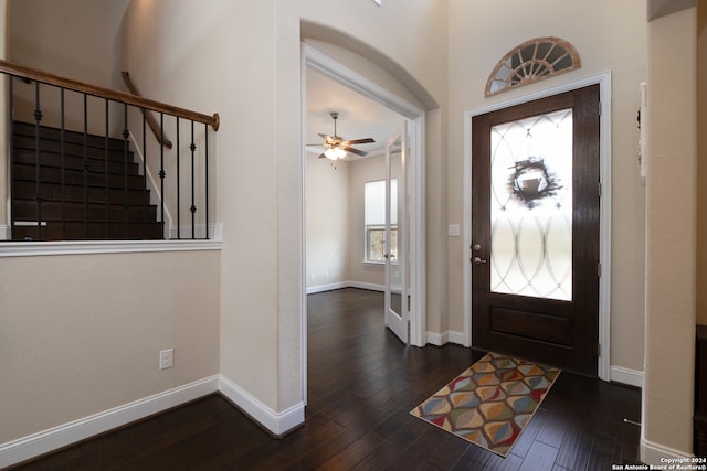 entrance foyer with dark wood-type flooring and ceiling fan