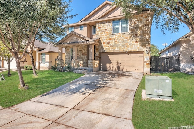 view of front of home featuring a garage and a front yard