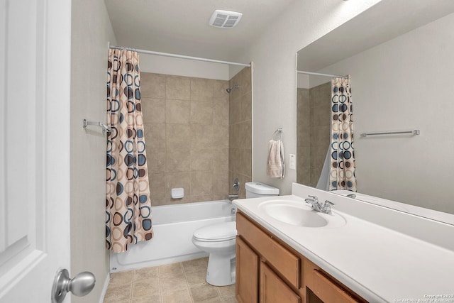 full bathroom with tile patterned flooring, shower / bath combo, toilet, and vanity