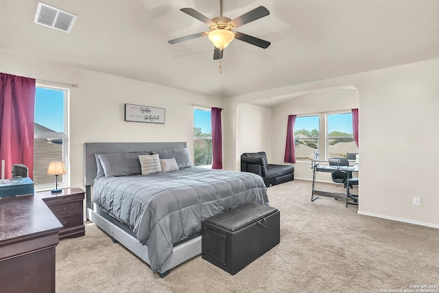 bedroom featuring light colored carpet and ceiling fan