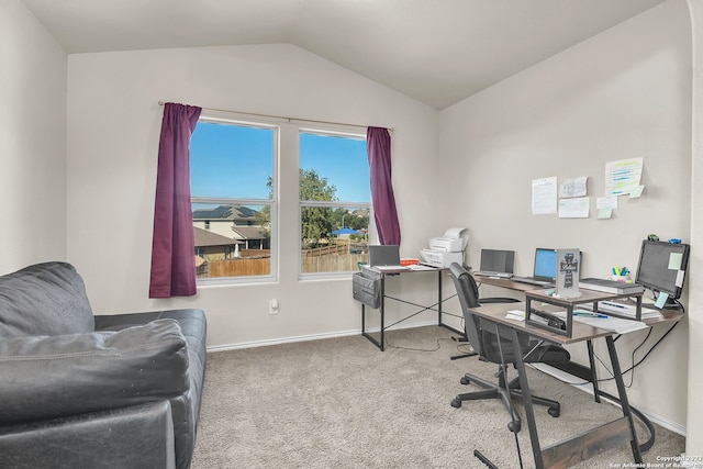 office space with carpet and lofted ceiling