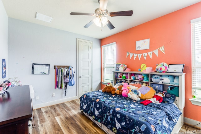 bedroom featuring ceiling fan and wood-type flooring