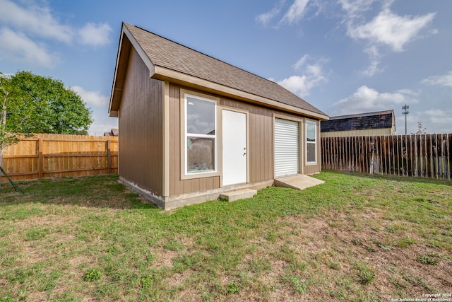 view of outdoor structure with a yard