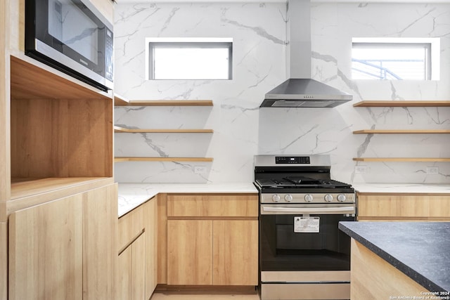 218 Pinckney St, San Antonio, TX 78209 - kitchen featuring tasteful backsplash, open shelves, wall chimney exhaust hood, modern cabinets, and stainless steel appliances