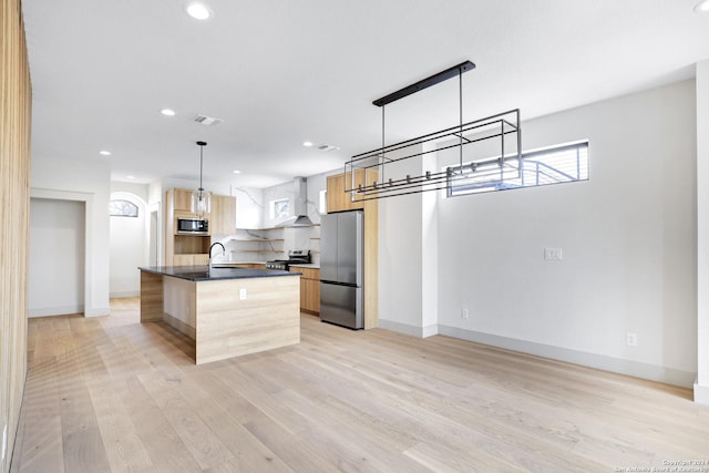 218 Pinckney St, San Antonio, TX 78209 - kitchen with baseboards, light wood-style flooring, dark countertops, visible vents, and stainless steel appliances