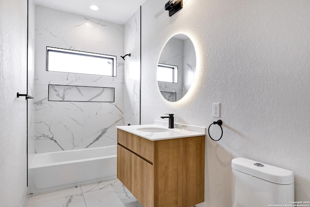 218 Pinckney St, San Antonio, TX 78209 - bathroom with washtub / shower combination, toilet, a textured wall, vanity, and marble finish floor