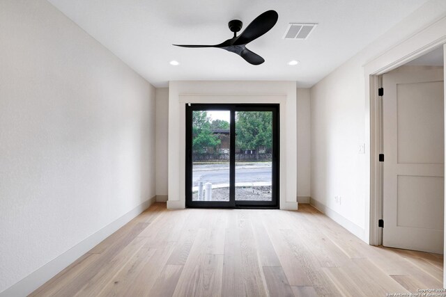 218 Pinckney St, San Antonio, TX 78209 - unfurnished room featuring light wood-style floors, baseboards, a ceiling fan, and visible vents