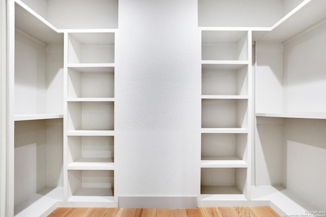 218 Pinckney St, San Antonio, TX 78209 - spacious closet featuring wood finished floors