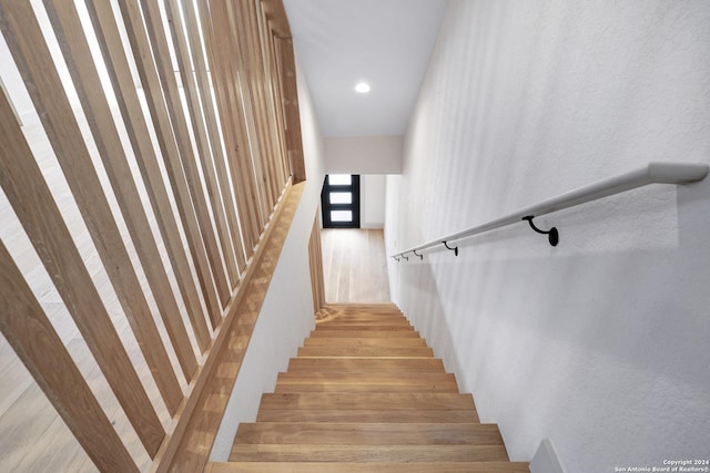 218 Pinckney St, San Antonio, TX 78209 - stairway with recessed lighting and wood finished floors