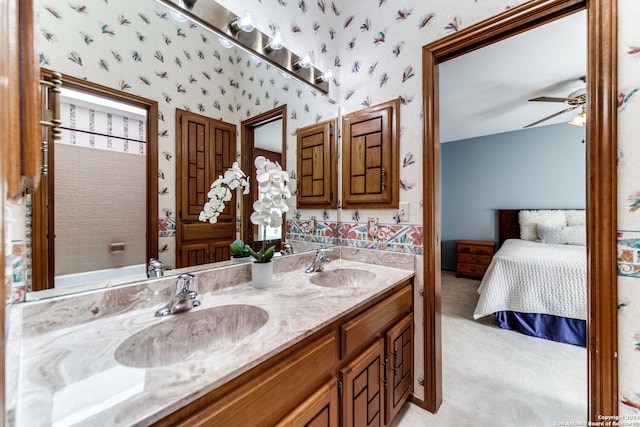 bathroom featuring double vanity and ceiling fan