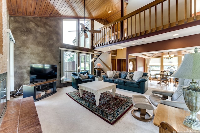 living room with wooden ceiling, high vaulted ceiling, ceiling fan with notable chandelier, and light carpet