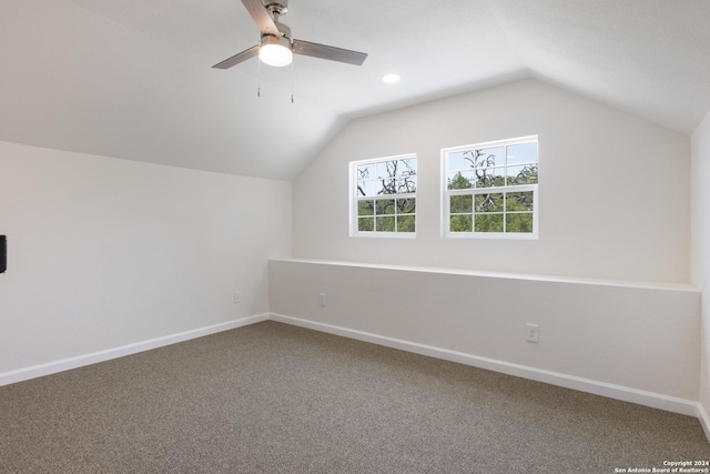 bonus room featuring vaulted ceiling, carpet, and ceiling fan