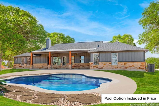 view of swimming pool with central AC unit, a patio area, and a lawn