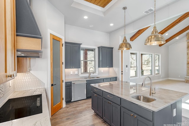 kitchen with sink, gray cabinetry, hanging light fixtures, a kitchen island with sink, and stainless steel dishwasher