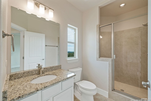 bathroom featuring walk in shower, tile patterned floors, vanity, and toilet