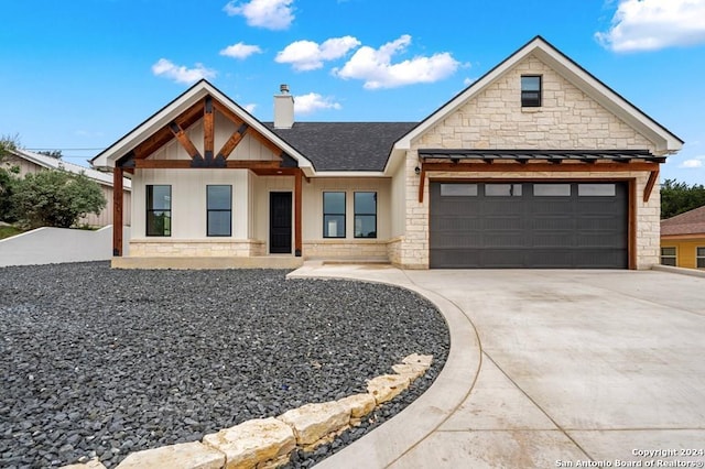 view of front of property featuring a garage