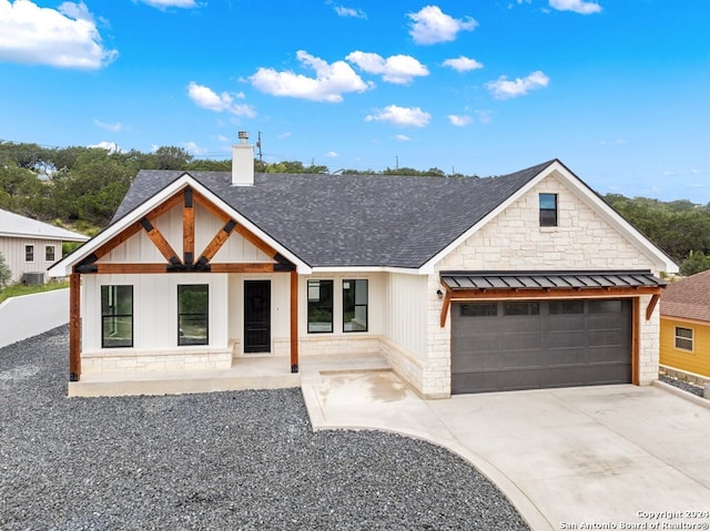 modern farmhouse style home with a garage