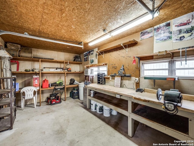 garage with a workshop area