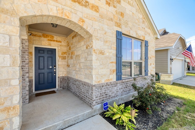 property entrance featuring a garage