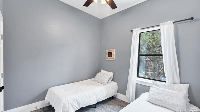 bedroom featuring ceiling fan and hardwood / wood-style floors