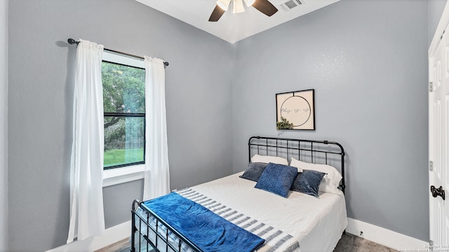 bedroom featuring ceiling fan