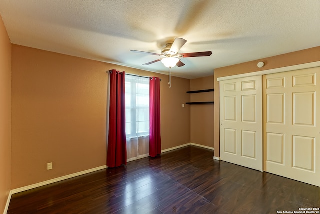 unfurnished bedroom featuring a closet, a textured ceiling, ceiling fan, and hardwood / wood-style floors