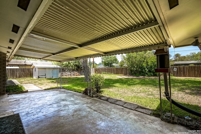 view of patio / terrace with a storage unit