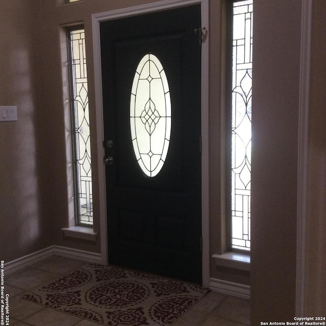 view of tiled foyer