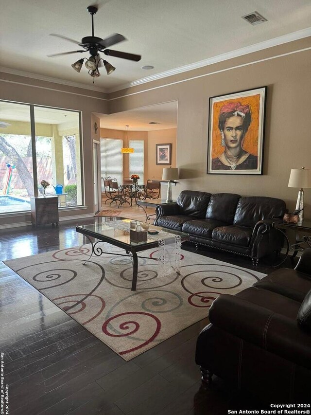 living room with ceiling fan, crown molding, and hardwood / wood-style flooring